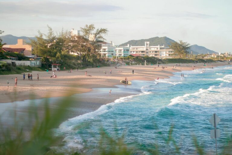 Scenic view of a vibrant Brazilian beach with people enjoying the summer day.