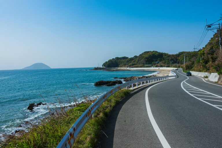 Discover the stunning seaside road along Fukuoka's picturesque coastline, ideal for travel enthusiasts.
