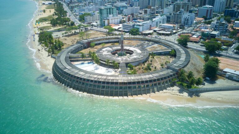Captivating aerial view of a circular beachside landmark in João Pessoa, Brazil.