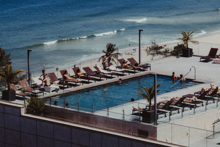 Relaxing rooftop pool scene overlooking the beach in Rio de Janeiro, Brasil.