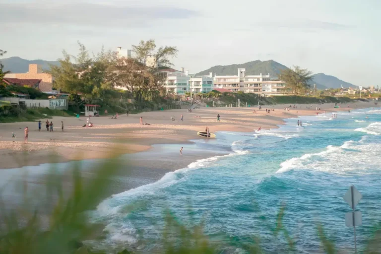 Scenic view of a vibrant Brazilian beach with people enjoying the summer day.